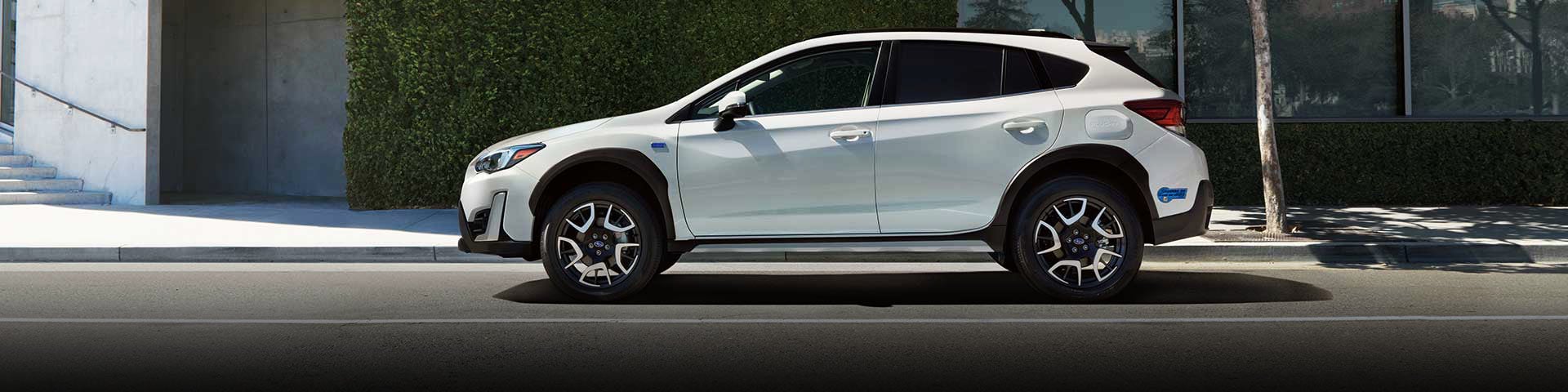 The side profile of a white Subaru Crosstrek Hybrid | Dutch Miller Subaru in Charleston WV