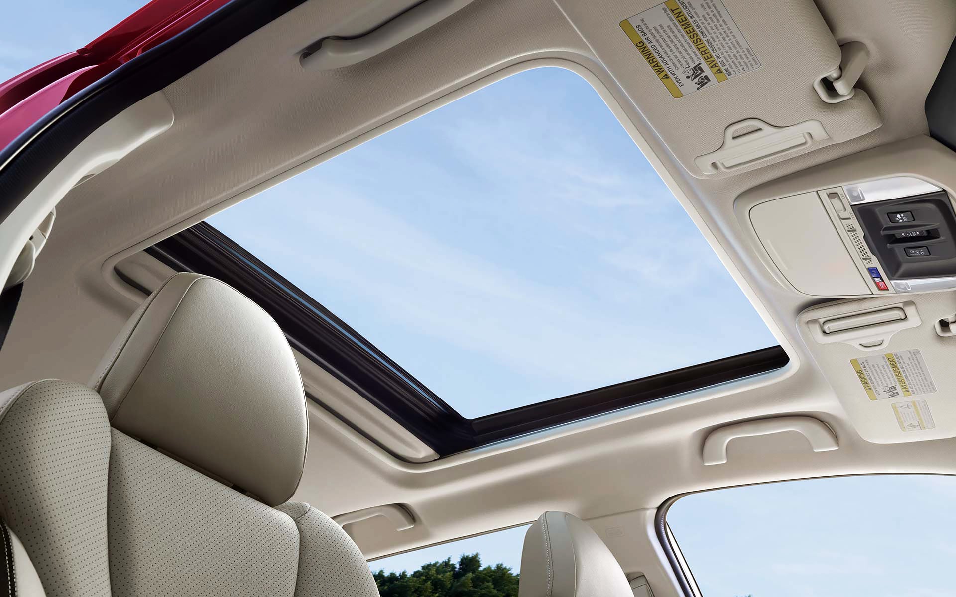 A view through the power sliding panoramic moonroof on the 2022 Forester Sport. | Dutch Miller Subaru in Charleston WV