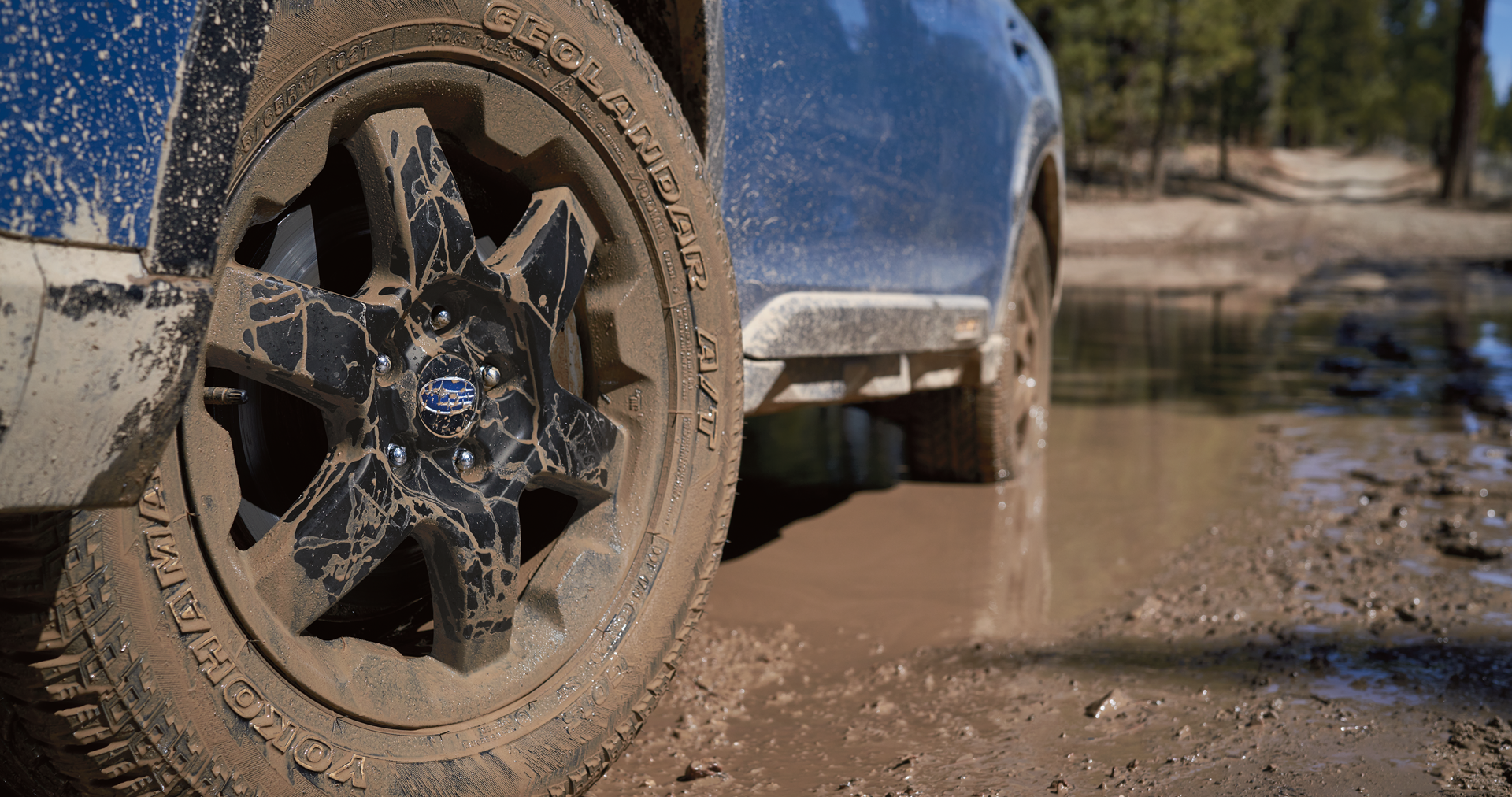 A close-up of the 17-inch off-road wheels and all-terrain Yokohama GEOLANDAR® tires on the 2023 Outback Wilderness. | Dutch Miller Subaru in Charleston WV
